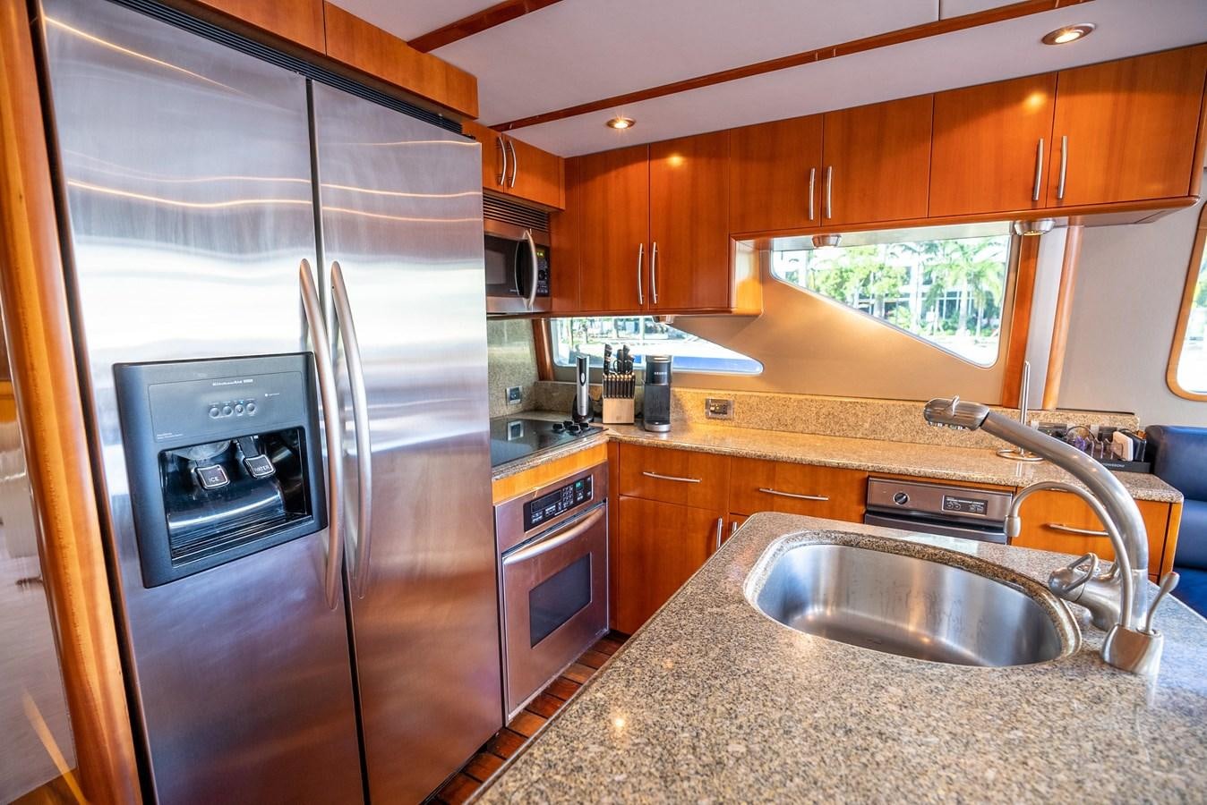 a kitchen with stainless steel appliances aboard EDITA  Yacht for Sale