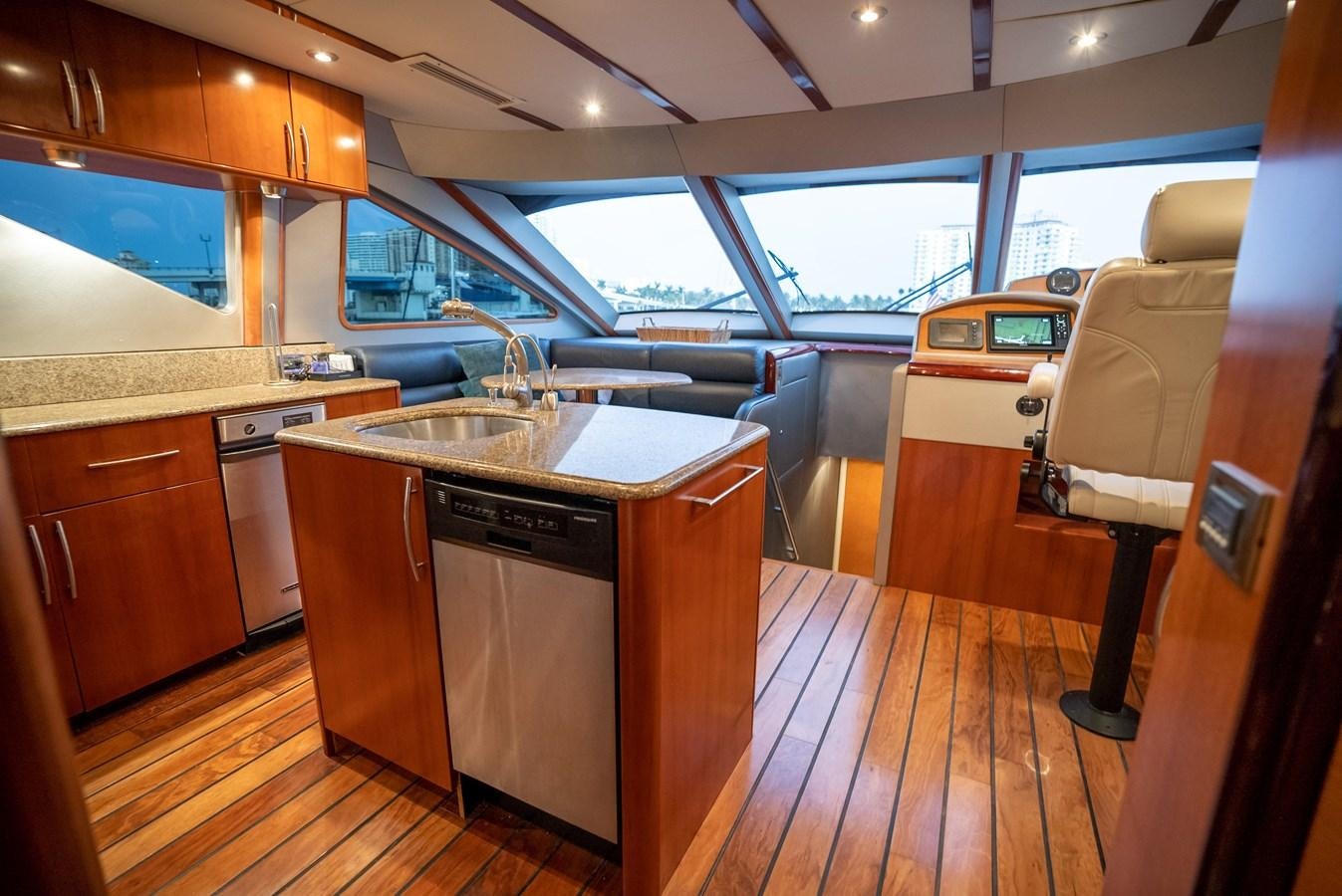 a kitchen with a sink and a window aboard EDITA  Yacht for Sale
