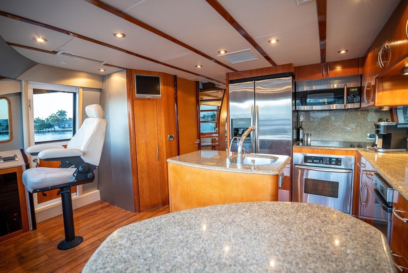 a kitchen with a large island aboard EDITA  Yacht for Sale