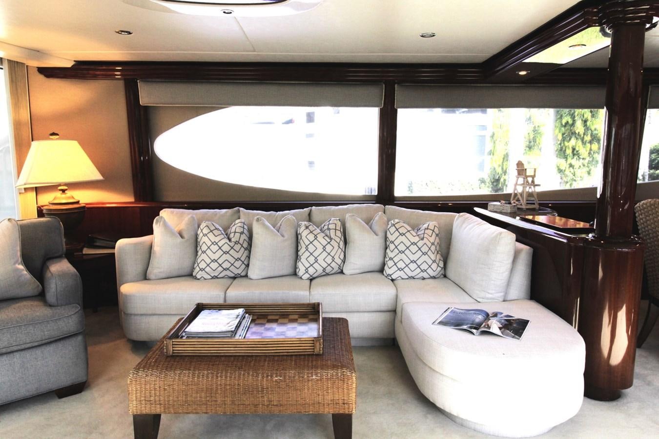 a living room with a large window aboard ARENITA Yacht for Sale