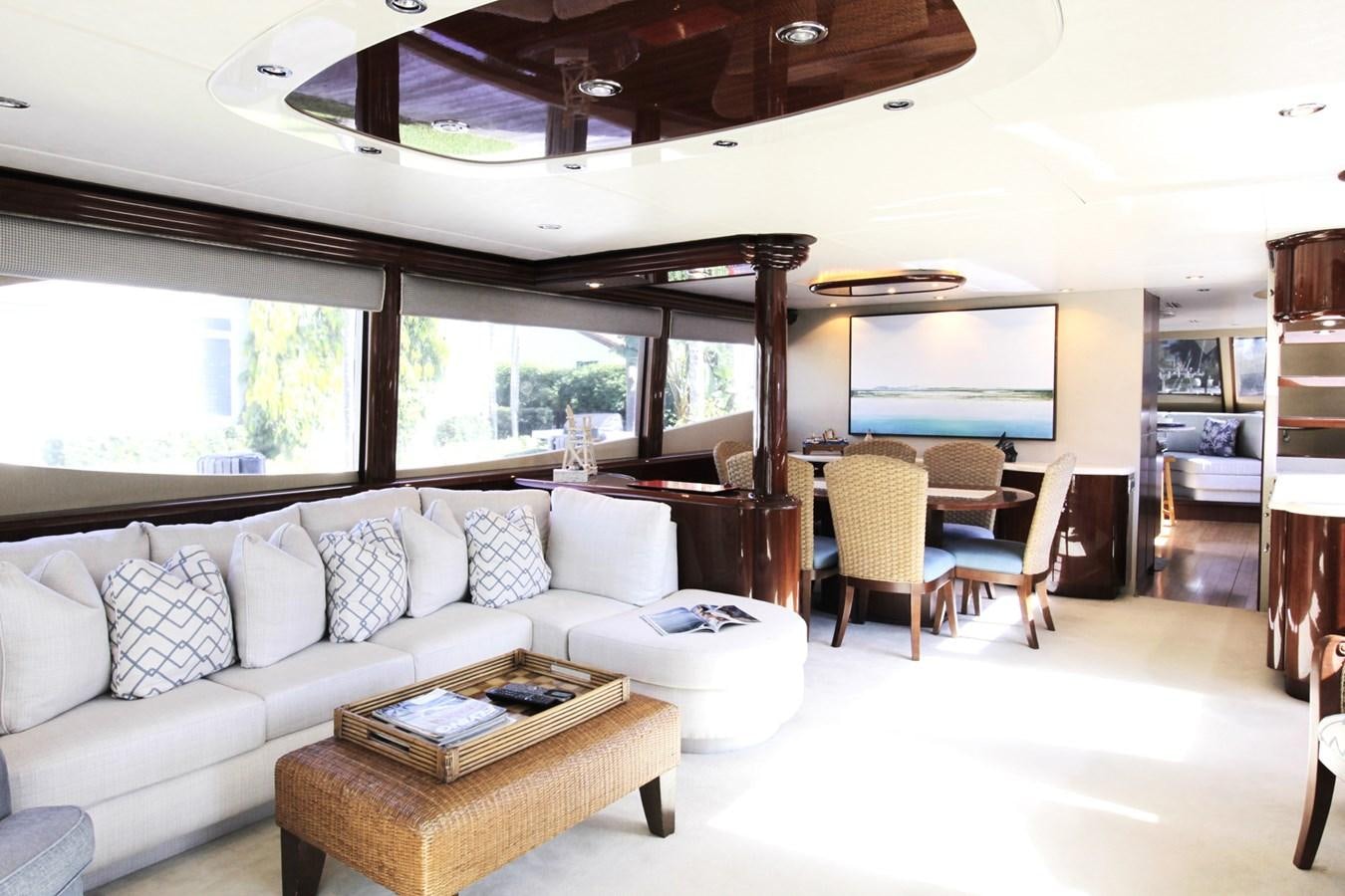 a living room with a couch and a table aboard ARENITA Yacht for Sale