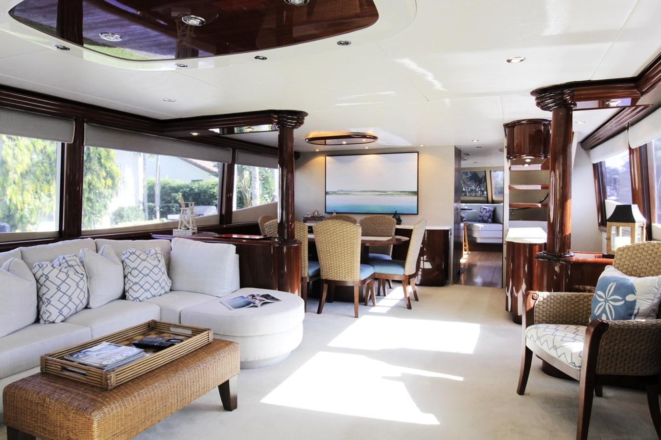 a living room with a couch and a table aboard ARENITA Yacht for Sale
