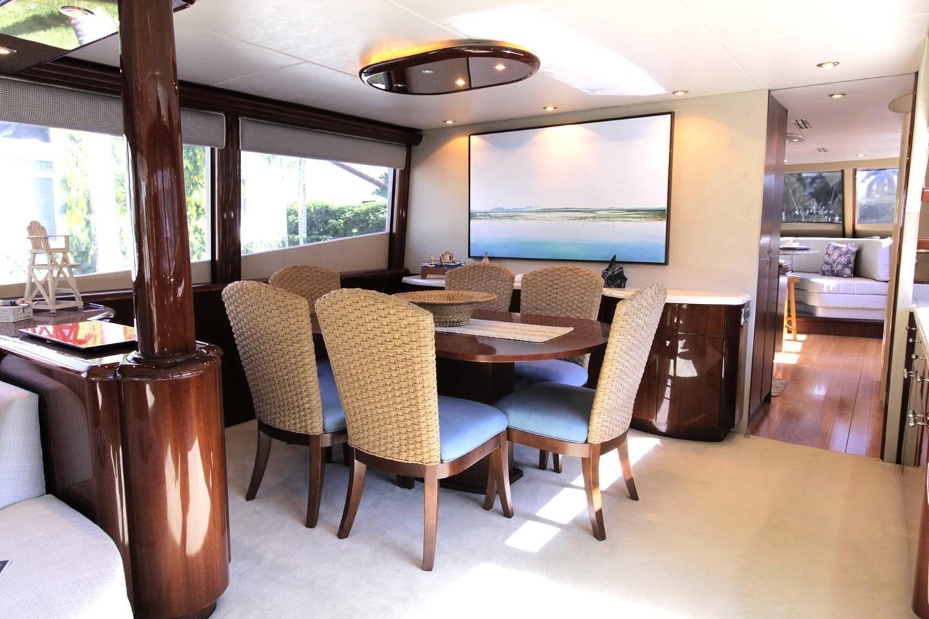 a dining room with a table and chairs aboard ARENITA Yacht for Sale