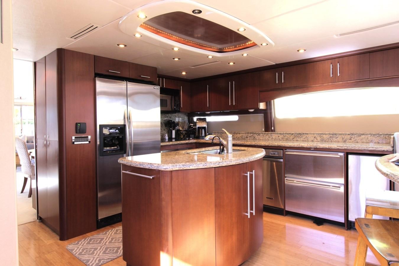 a kitchen with a large island aboard ARENITA Yacht for Sale