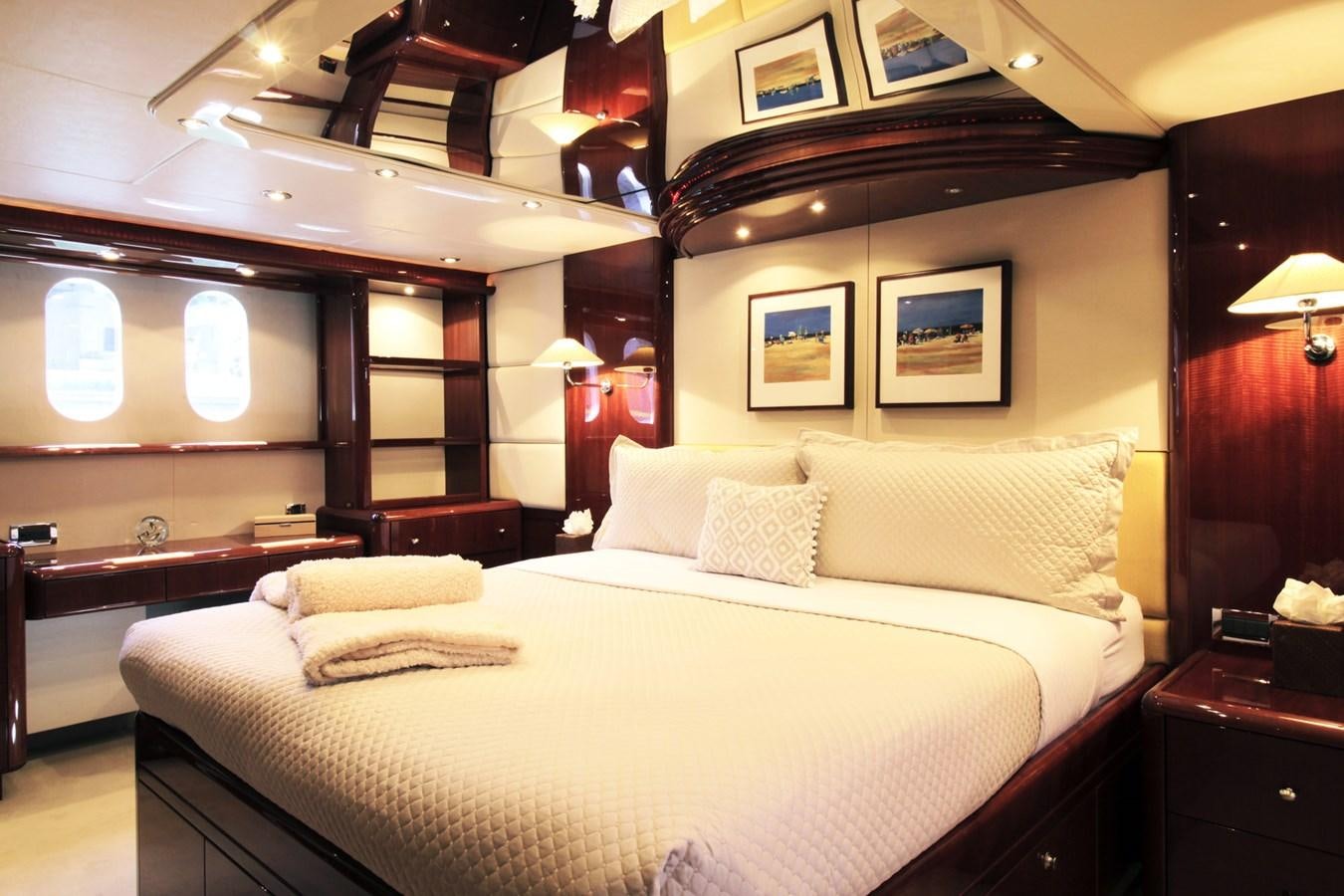 a bed with pillows aboard ARENITA Yacht for Sale