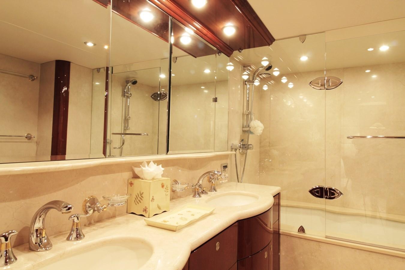 a bathroom with a sink and a mirror aboard ARENITA Yacht for Sale