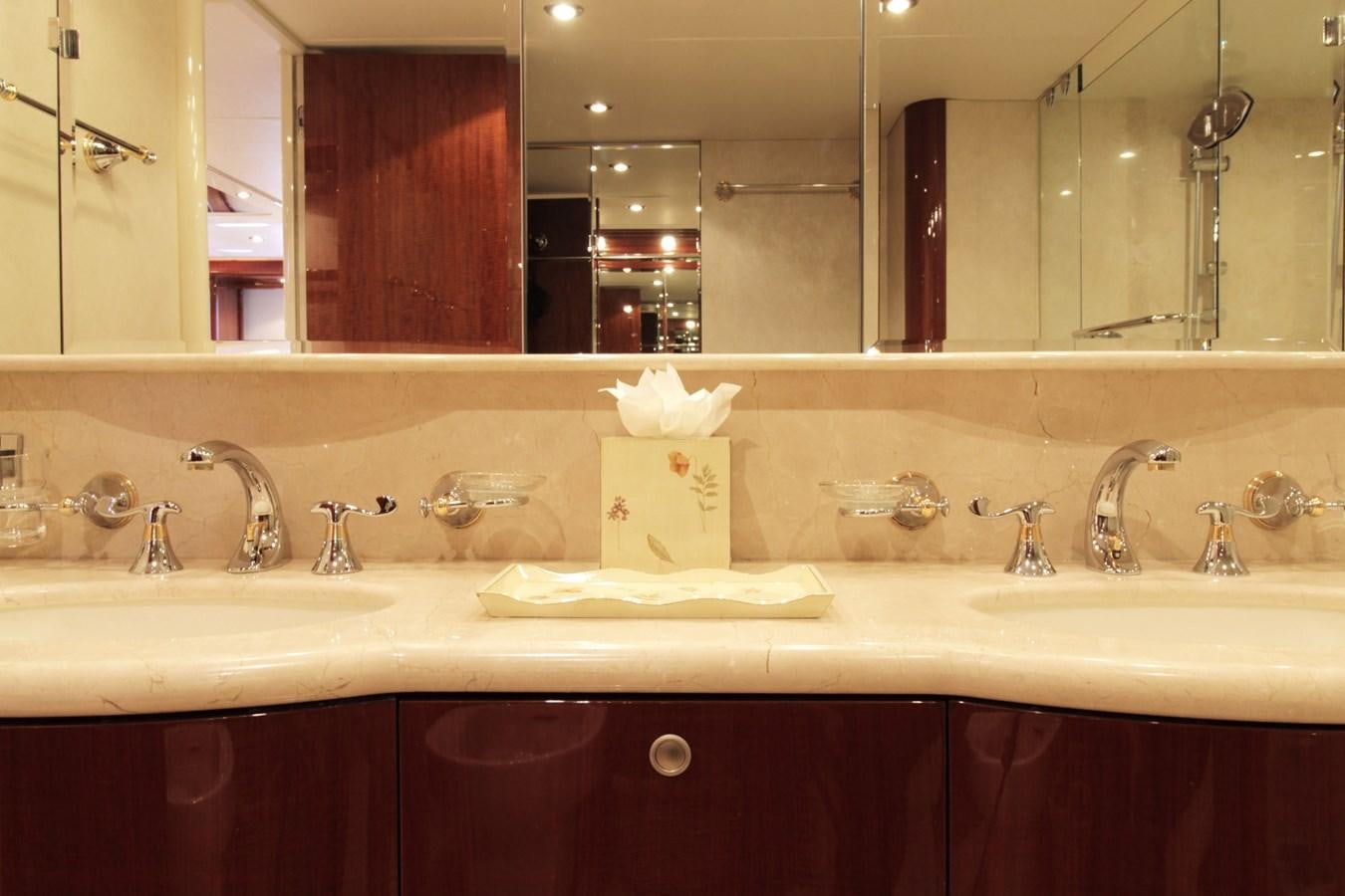 a bathroom with a large mirror aboard ARENITA Yacht for Sale