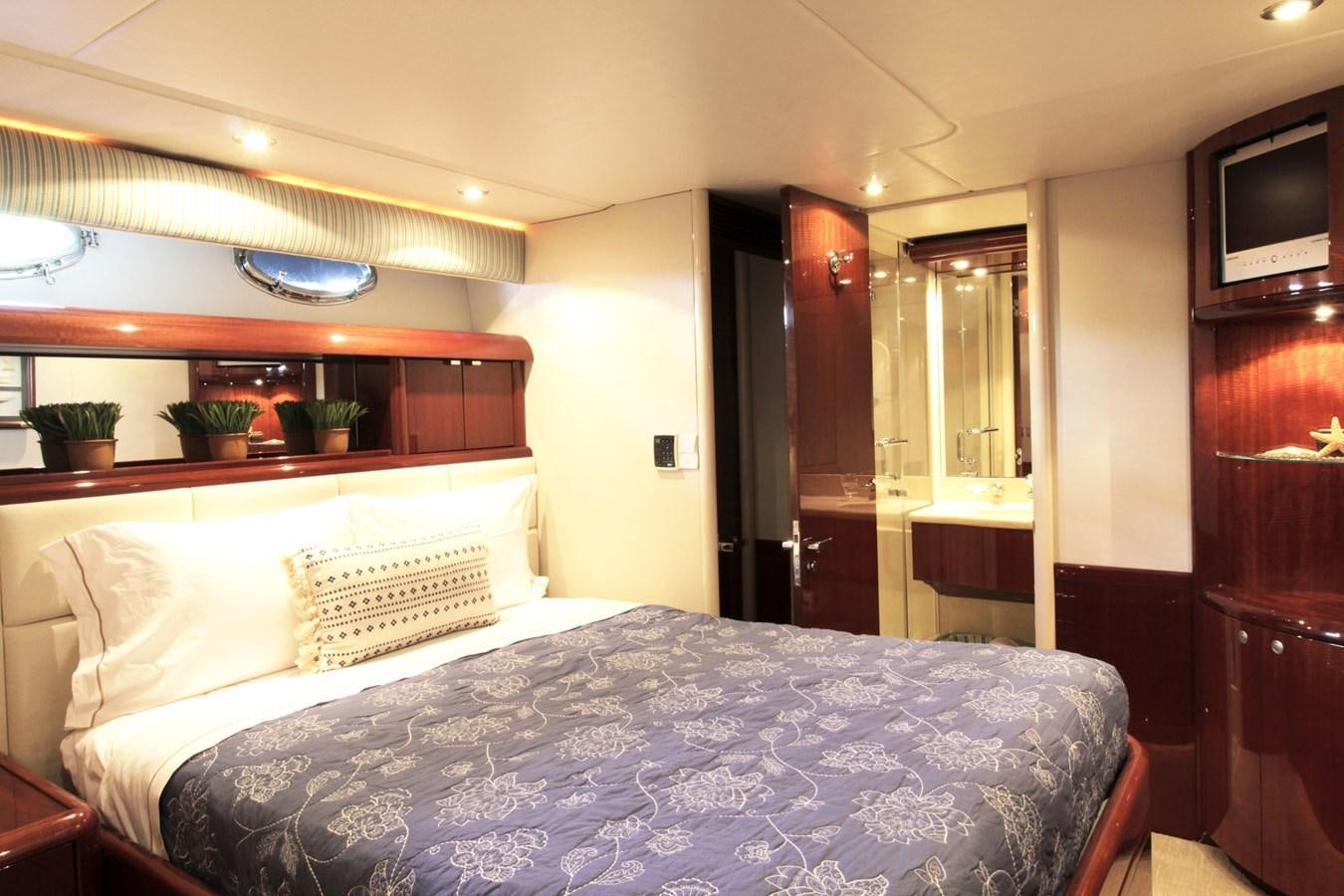 a bed in a hotel room aboard ARENITA Yacht for Sale