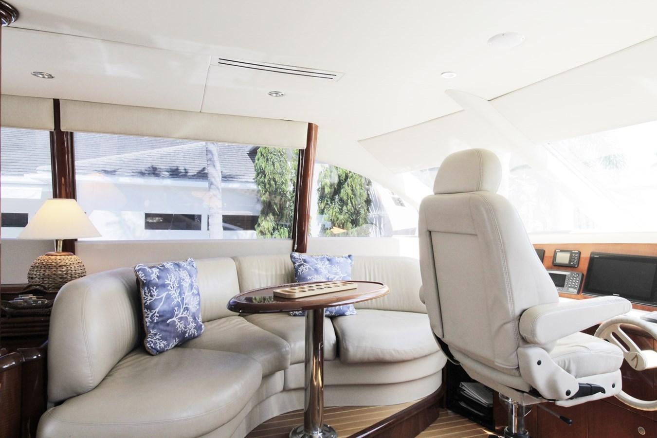a living room with a large window aboard ARENITA Yacht for Sale
