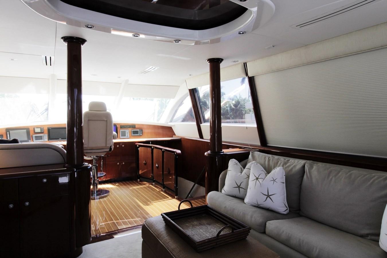 a living room with a couch and a television aboard ARENITA Yacht for Sale