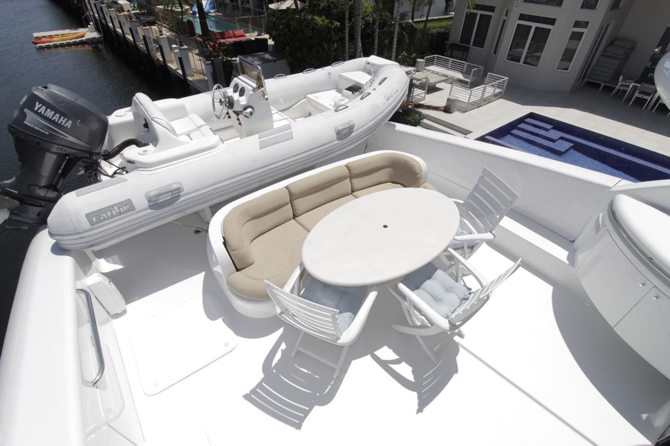 a white car with a black wheel aboard ARENITA Yacht for Sale