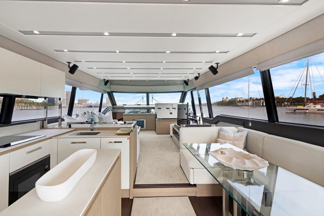 a room with a view of the ocean and the deck aboard JUIL OF THE SEA Yacht for Sale