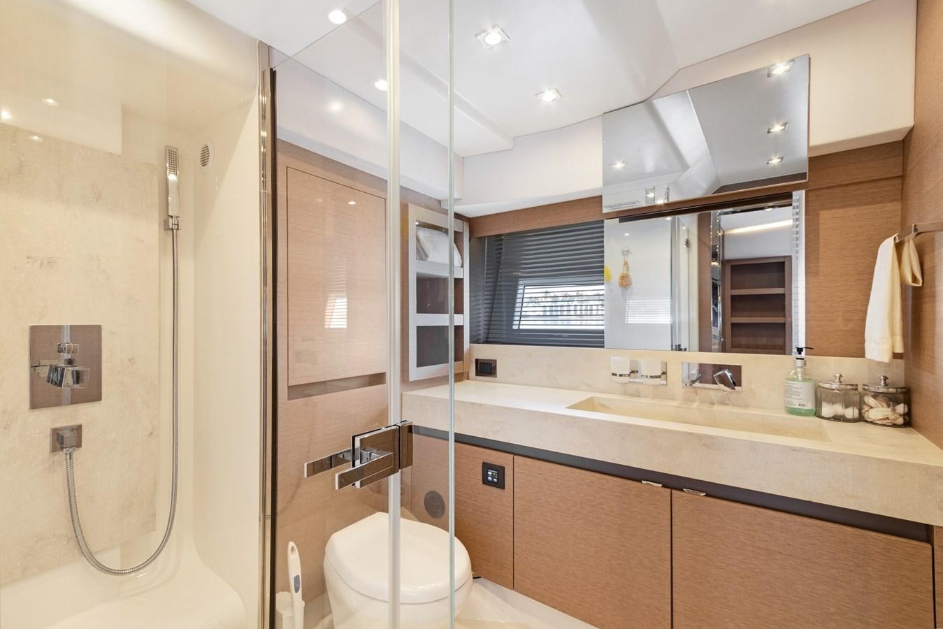 a bathroom with a glass shower aboard JUIL OF THE SEA Yacht for Sale