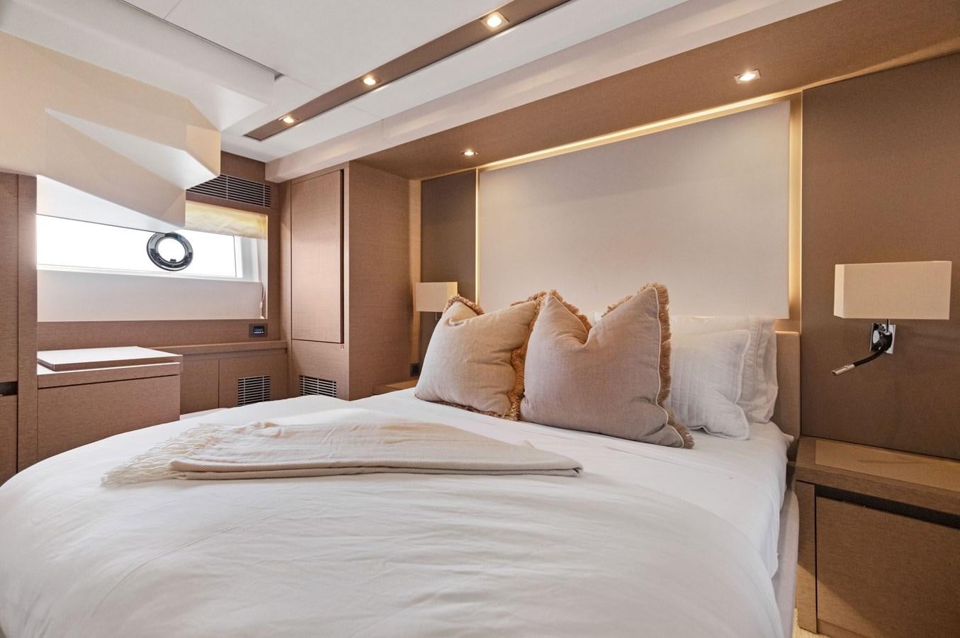 a large bed with white sheets aboard JUIL OF THE SEA Yacht for Sale