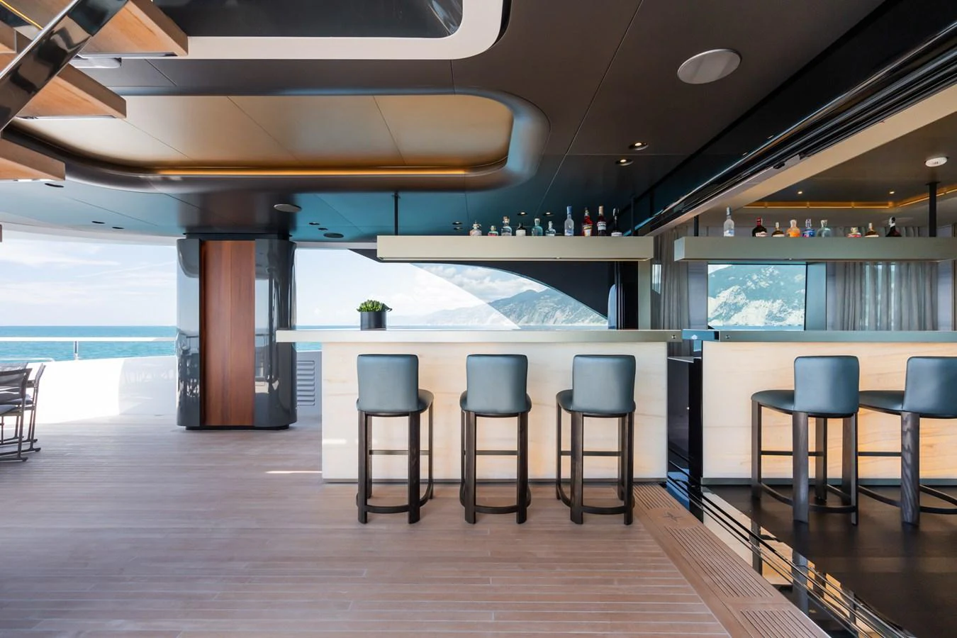 a room with a table and chairs aboard SILVER STAR I Yacht for Sale