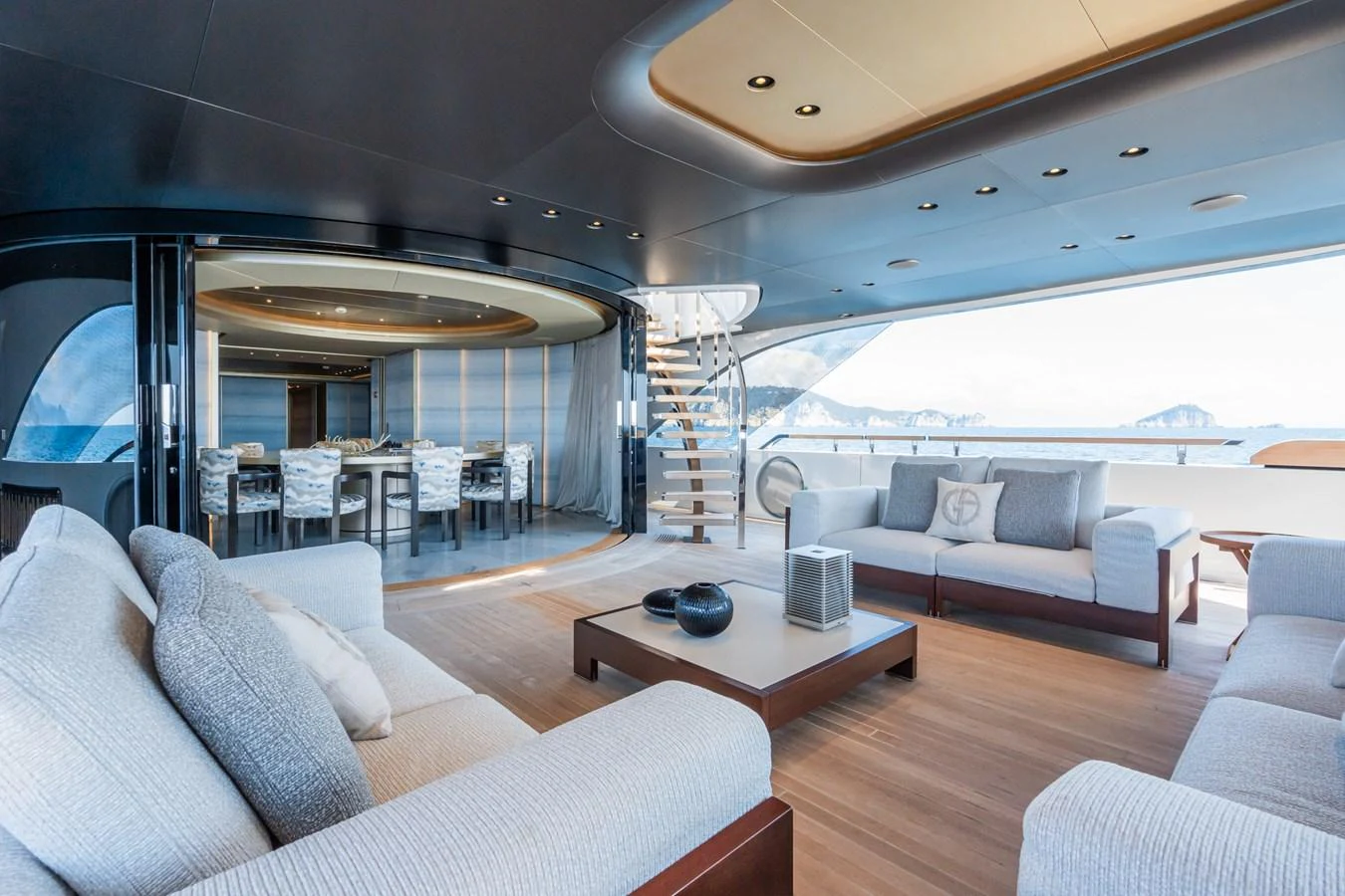 a living room with a large window aboard SILVER STAR I Yacht for Sale
