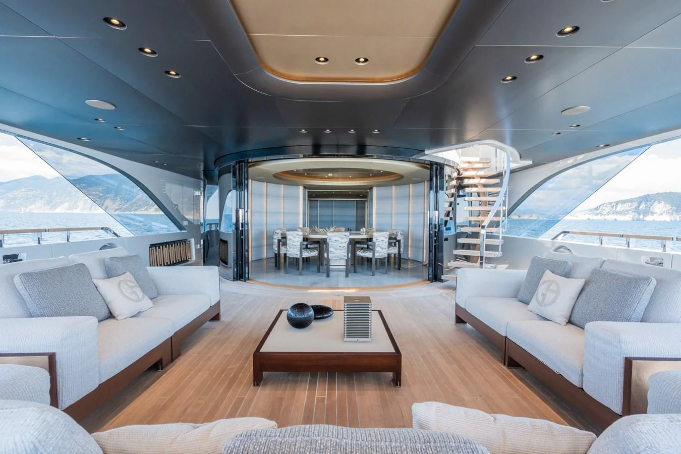 a living room with a large glass window aboard SILVER STAR I Yacht for Sale