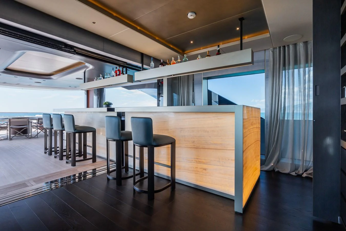 a room with a table and chairs aboard SILVER STAR I Yacht for Sale