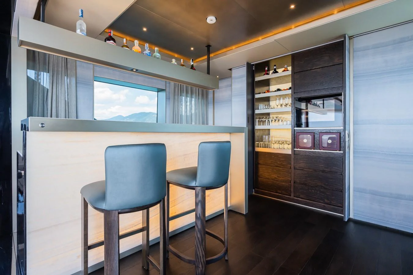 a room with a desk and chairs aboard SILVER STAR I Yacht for Sale