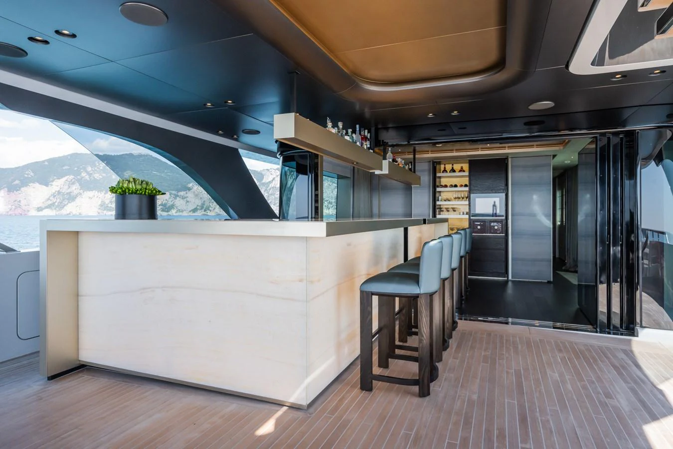 a room with a table and chairs aboard SILVER STAR I Yacht for Sale