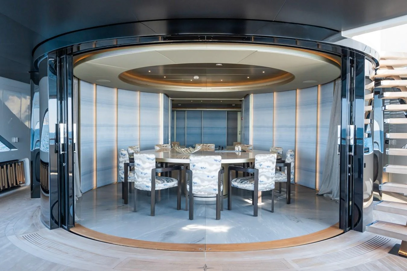 a room with a table and chairs aboard SILVER STAR I Yacht for Sale