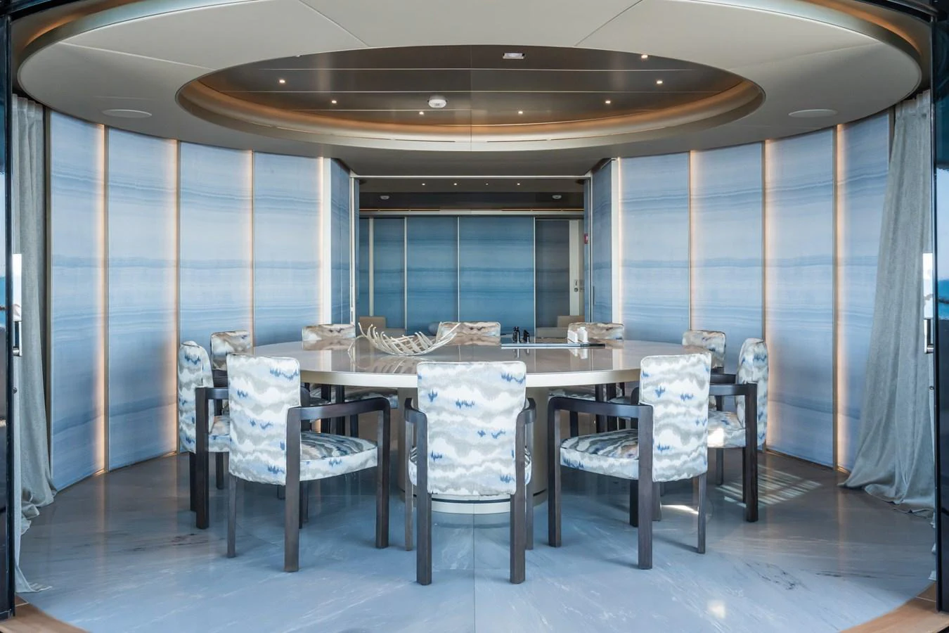 a room with a table and chairs aboard SILVER STAR I Yacht for Sale