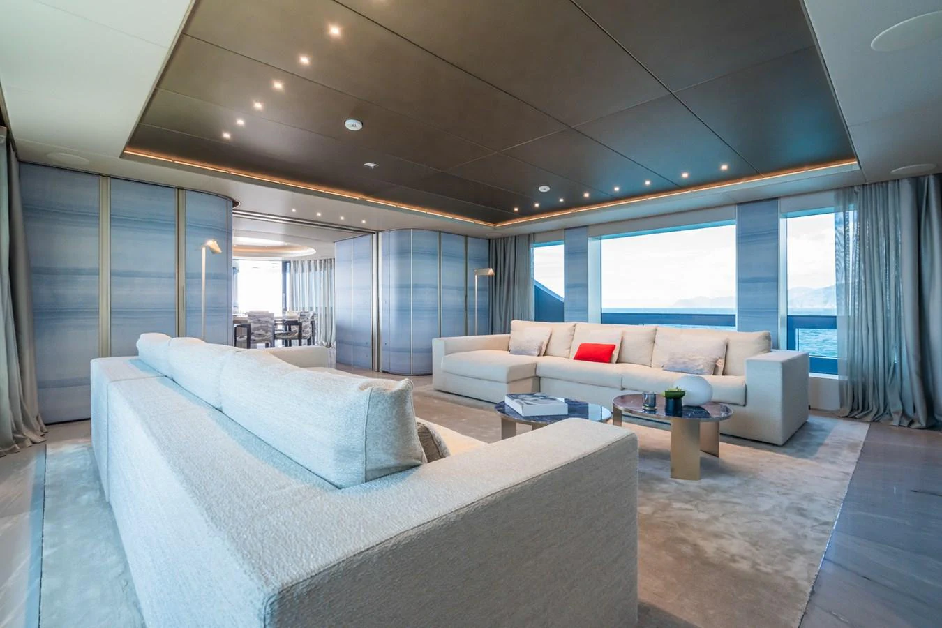 a living room with a large window aboard SILVER STAR I Yacht for Sale