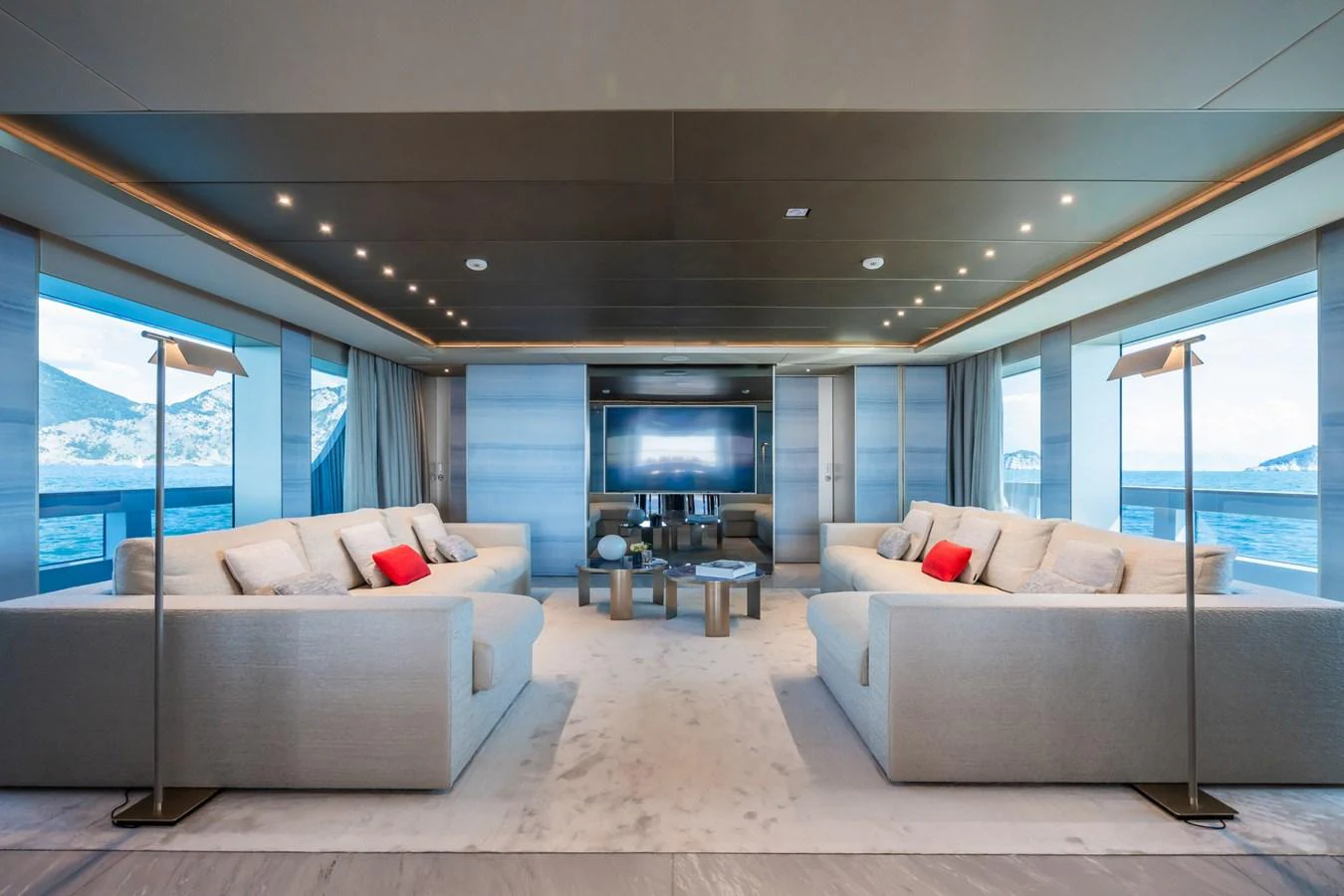 a living room with a large window aboard SILVER STAR I Yacht for Sale