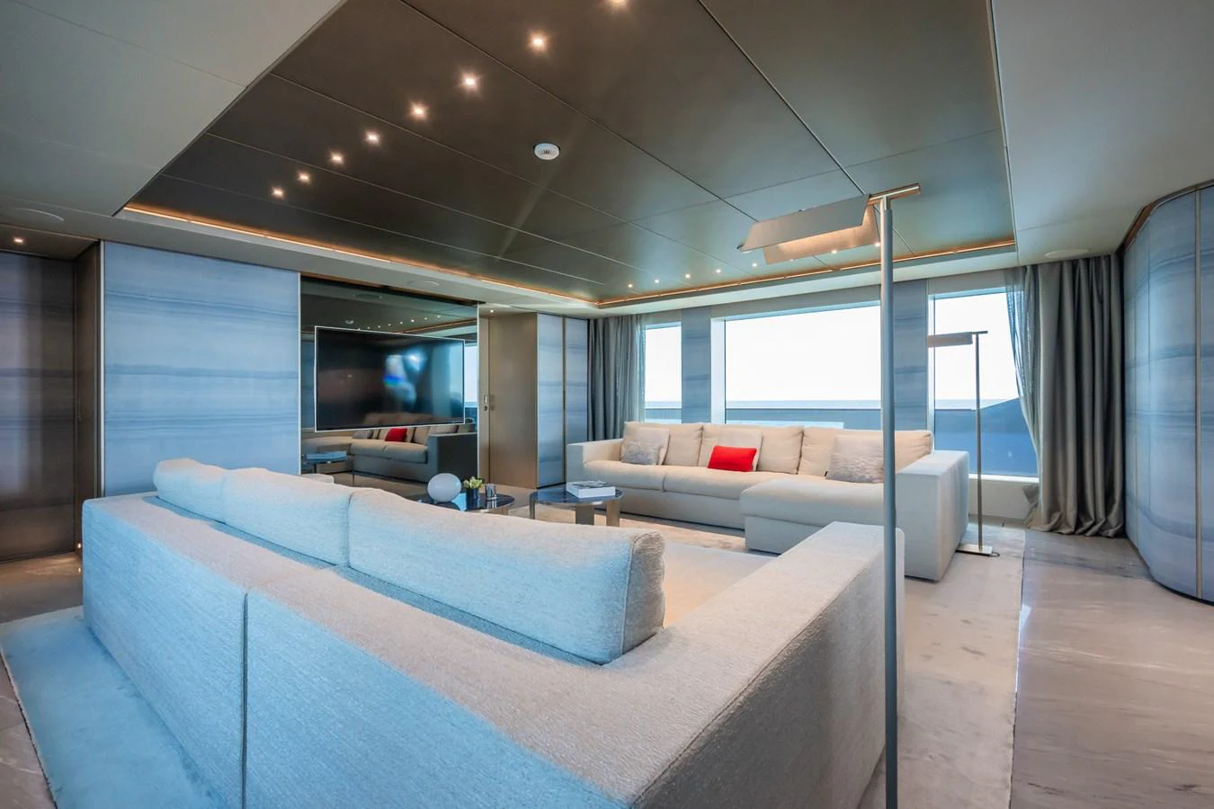 a living room with a couch and a tv aboard SILVER STAR I Yacht for Sale