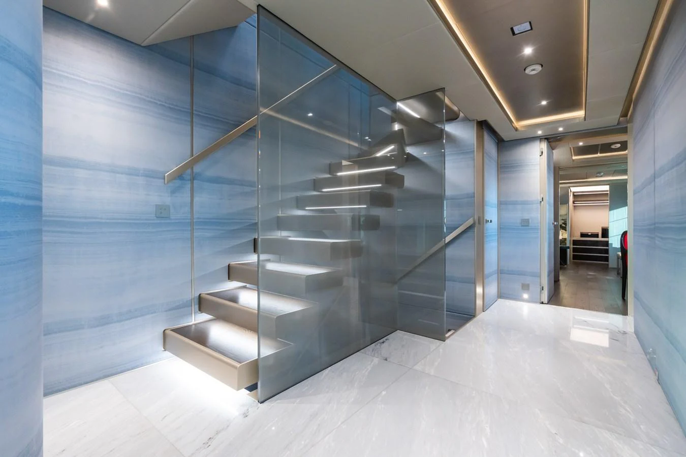 a large staircase in a building aboard SILVER STAR I Yacht for Sale