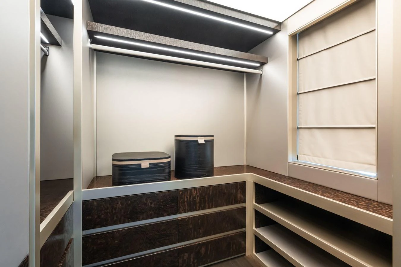 a kitchen with a large black shelf aboard SILVER STAR I Yacht for Sale