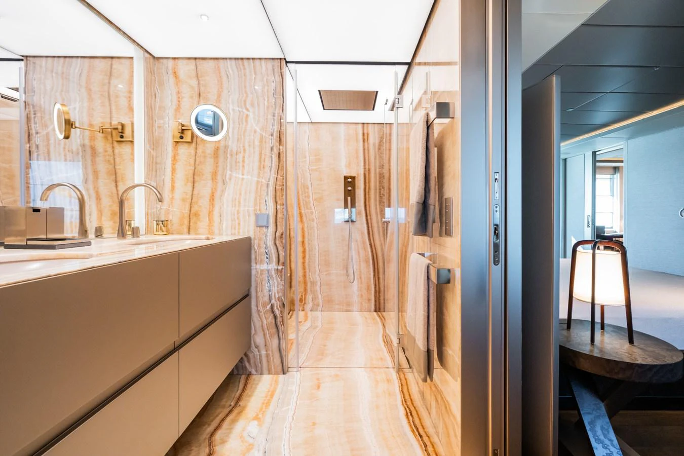 a bathroom with a tub and sink aboard SILVER STAR I Yacht for Sale