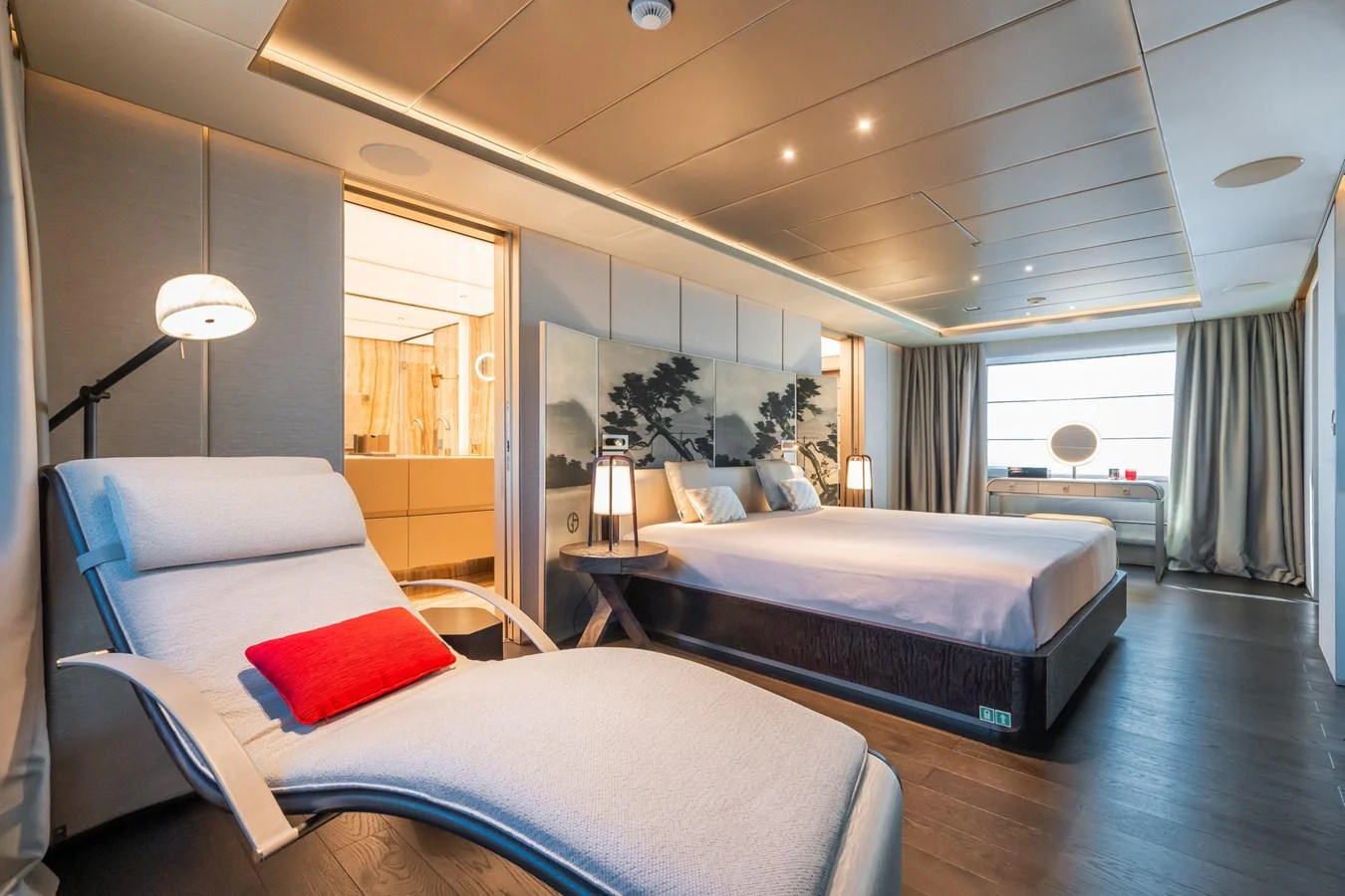 a bedroom with a large bed aboard SILVER STAR I Yacht for Sale