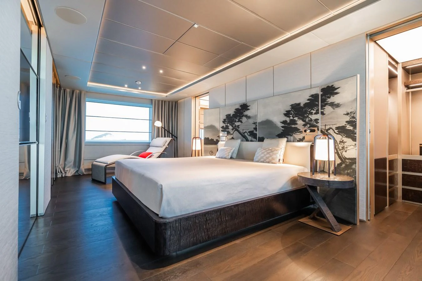 a bedroom with a large bed aboard SILVER STAR I Yacht for Sale