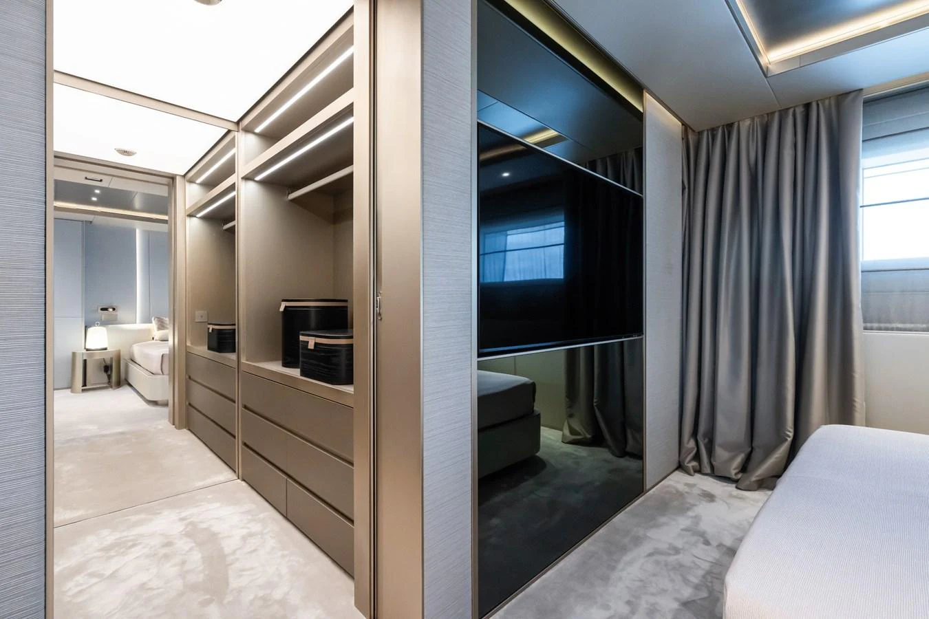 a room with a bed and a television aboard SILVER STAR I Yacht for Sale