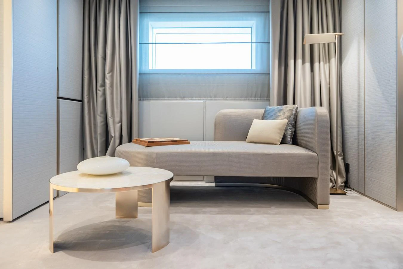 a couch and table in a room aboard SILVER STAR I Yacht for Sale