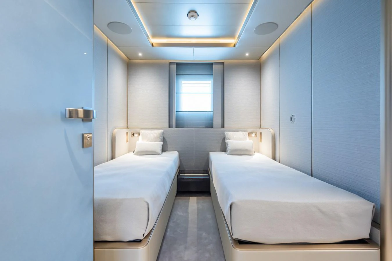 a room with a couple of beds aboard SILVER STAR I Yacht for Sale