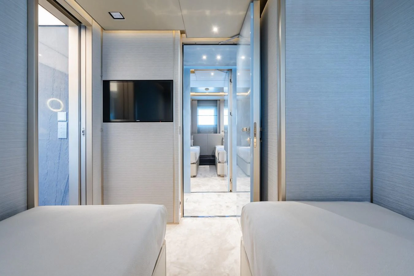 a room with a bed and a closet aboard SILVER STAR I Yacht for Sale
