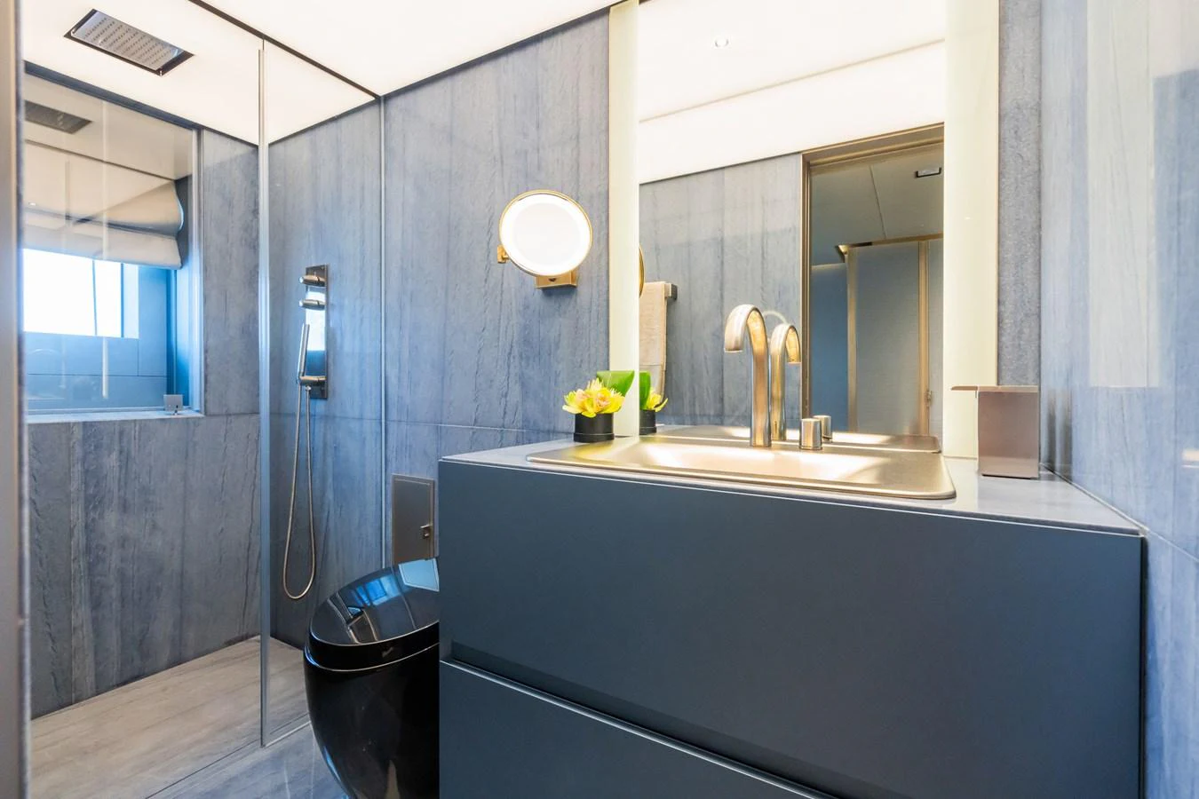 a bathroom with a countertop sink and a mirror aboard SILVER STAR I Yacht for Sale