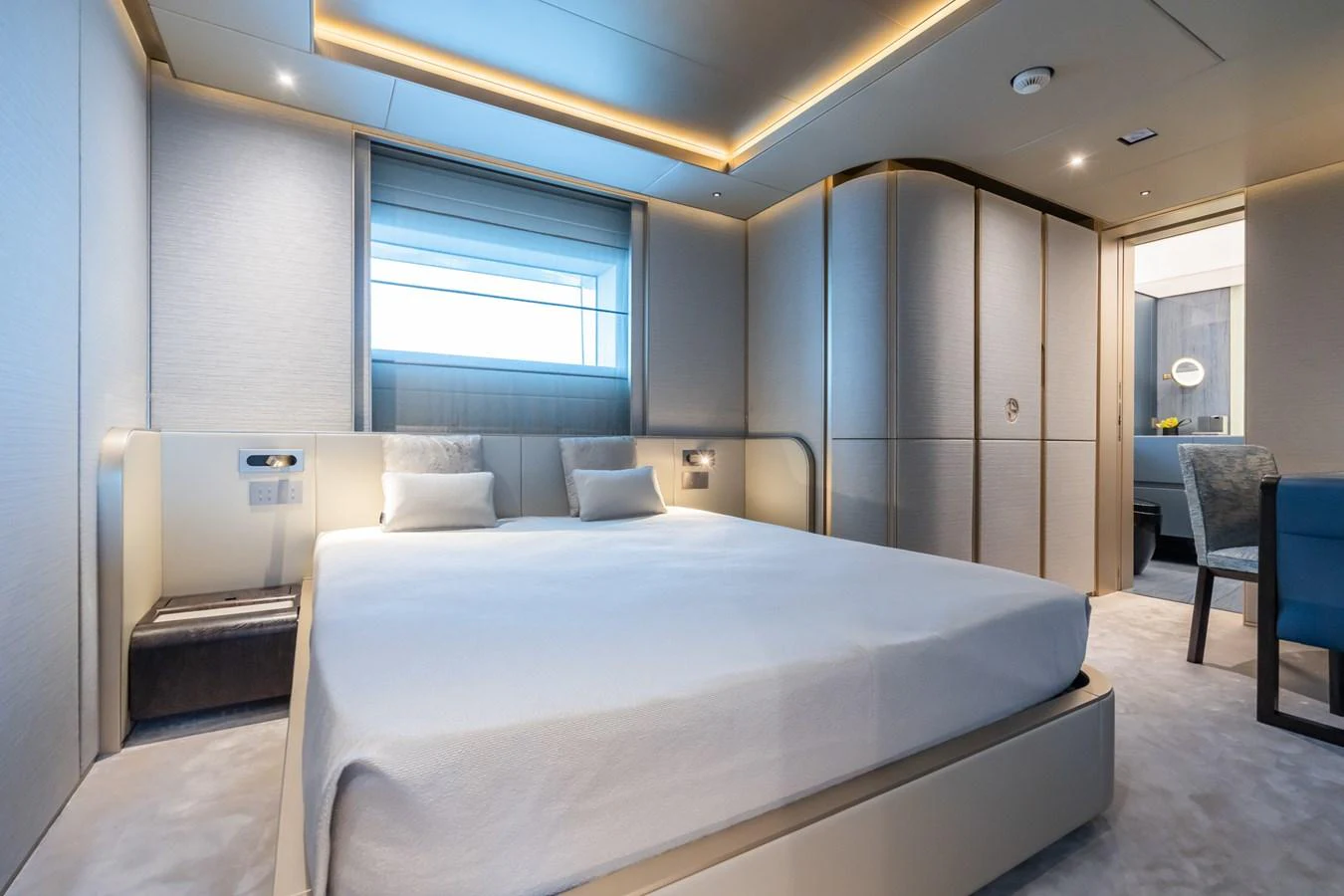 a large bedroom with a bed aboard SILVER STAR I Yacht for Sale
