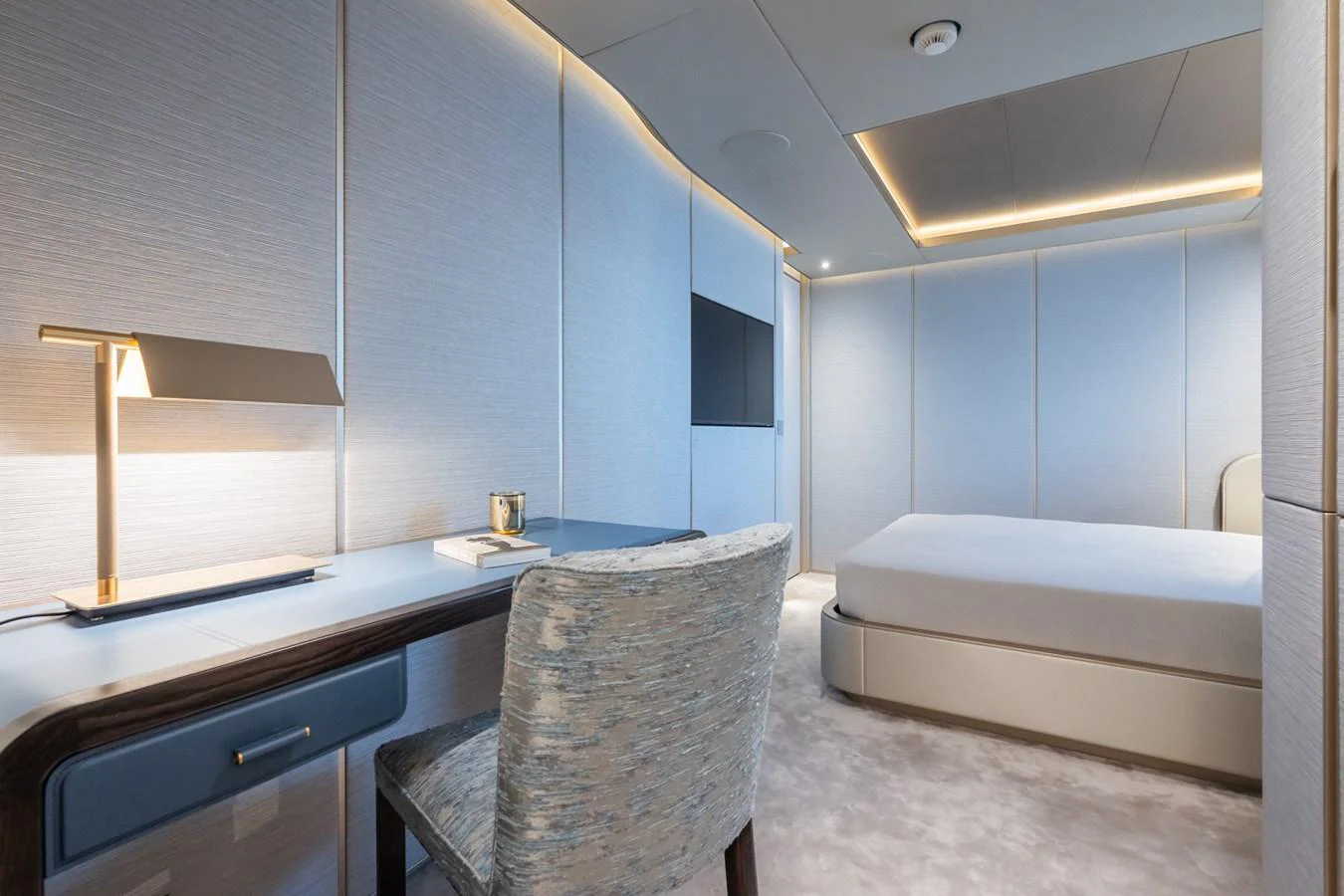 a room with a chair and a desk aboard SILVER STAR I Yacht for Sale