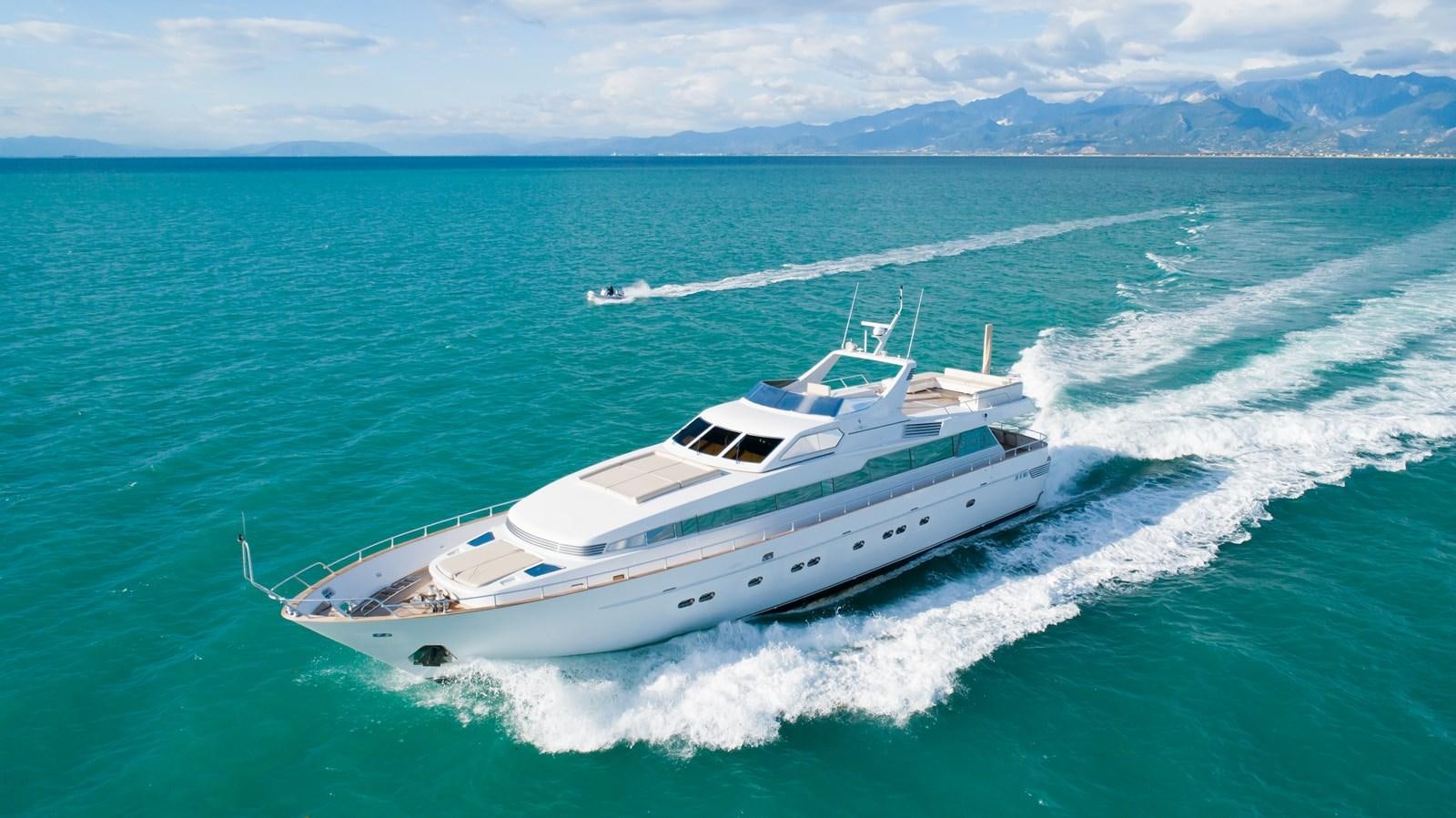 a white boat on the water aboard BABY BOSS Yacht for Sale