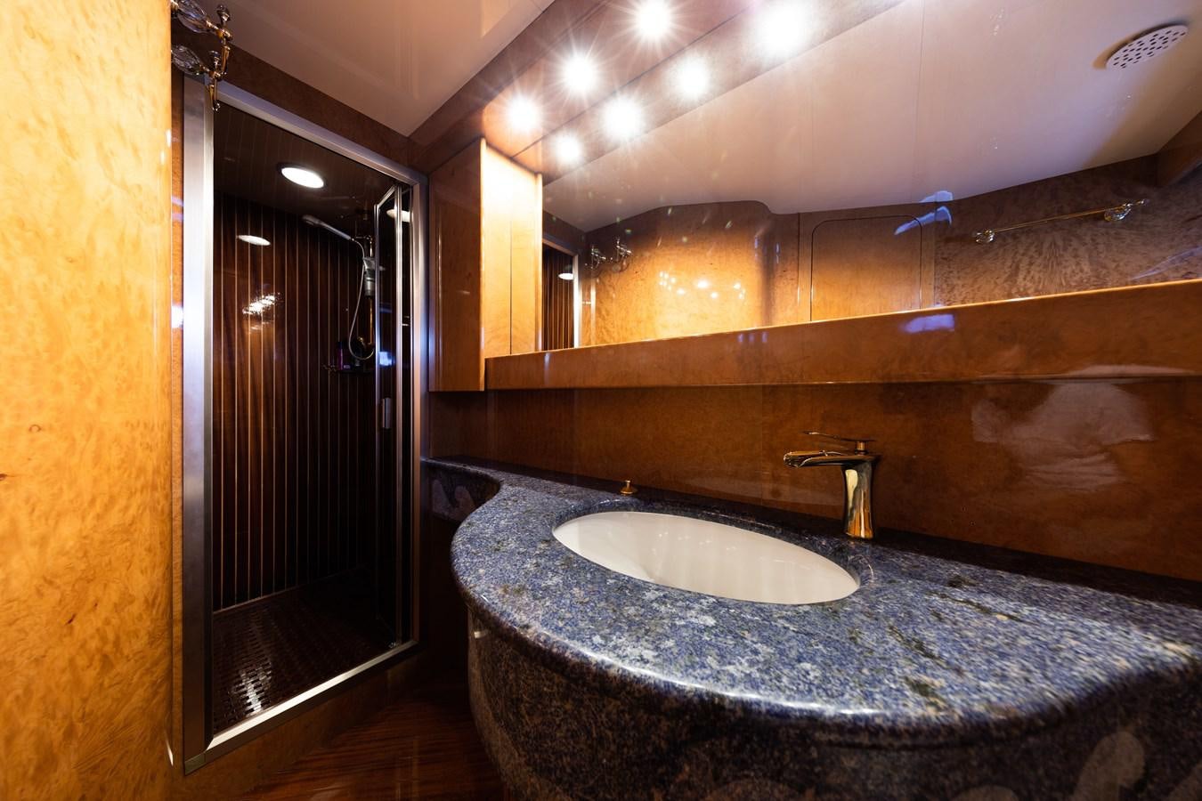 a bathroom with a marble counter top aboard BABY BOSS Yacht for Sale