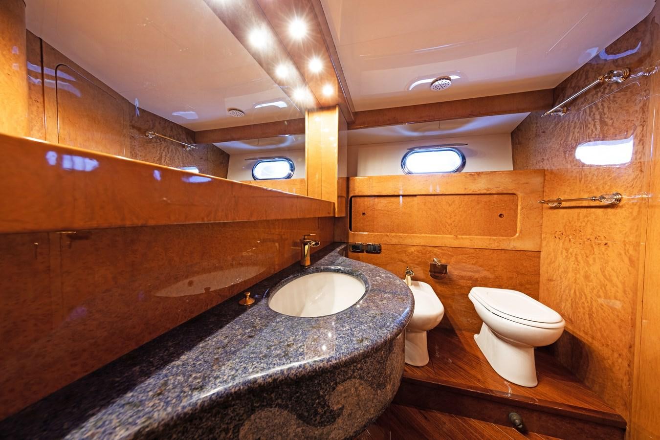 a bathroom with a marble countertop aboard BABY BOSS Yacht for Sale