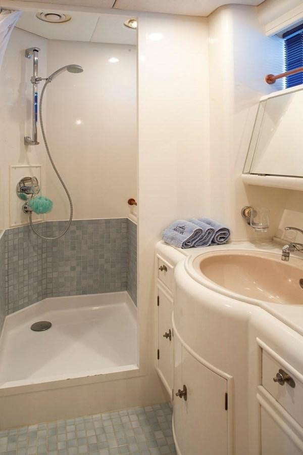 a bathroom with a shower and sink aboard ARMATHIA Yacht for Sale