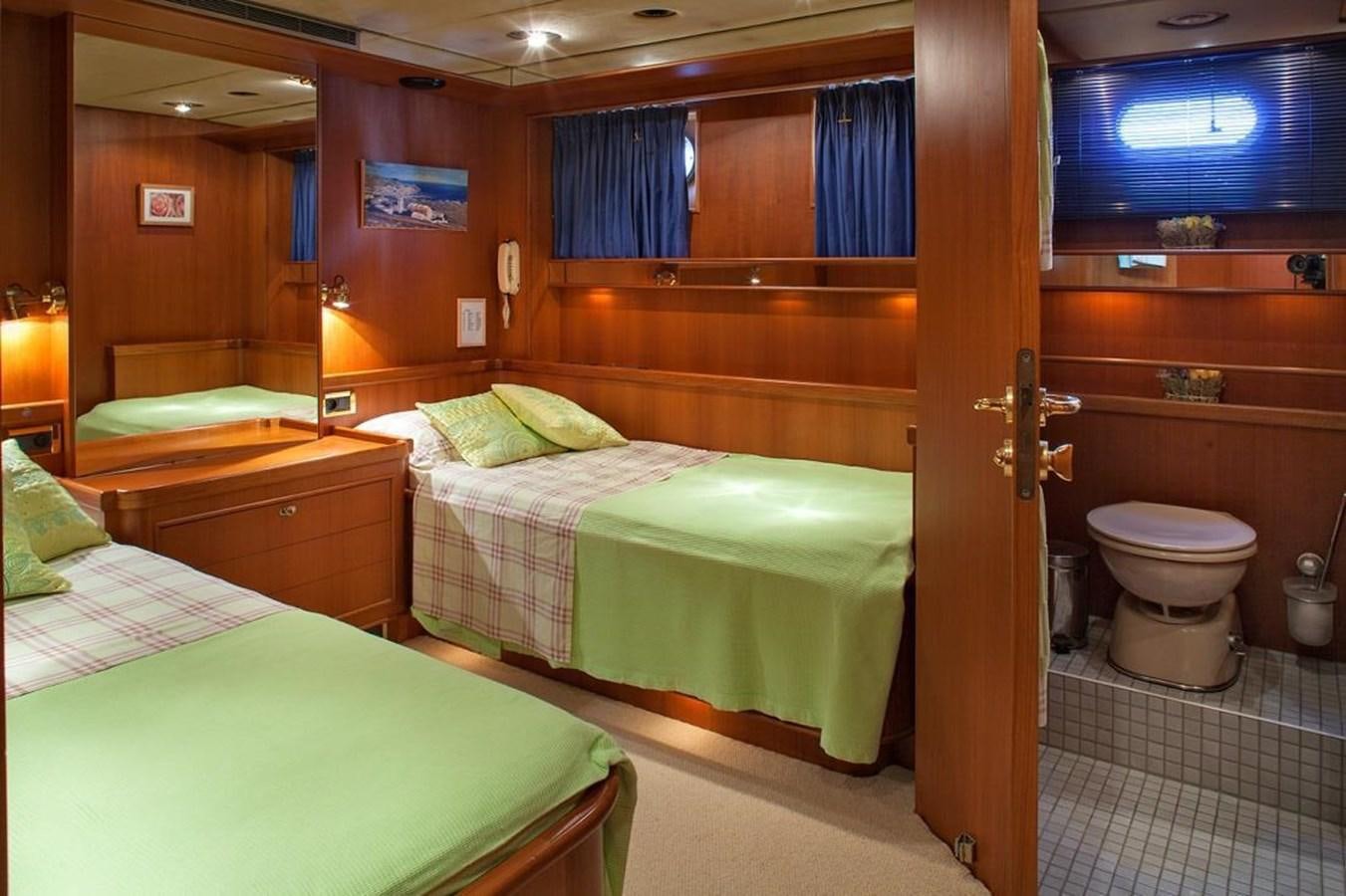 a room with two beds aboard ARMATHIA Yacht for Sale