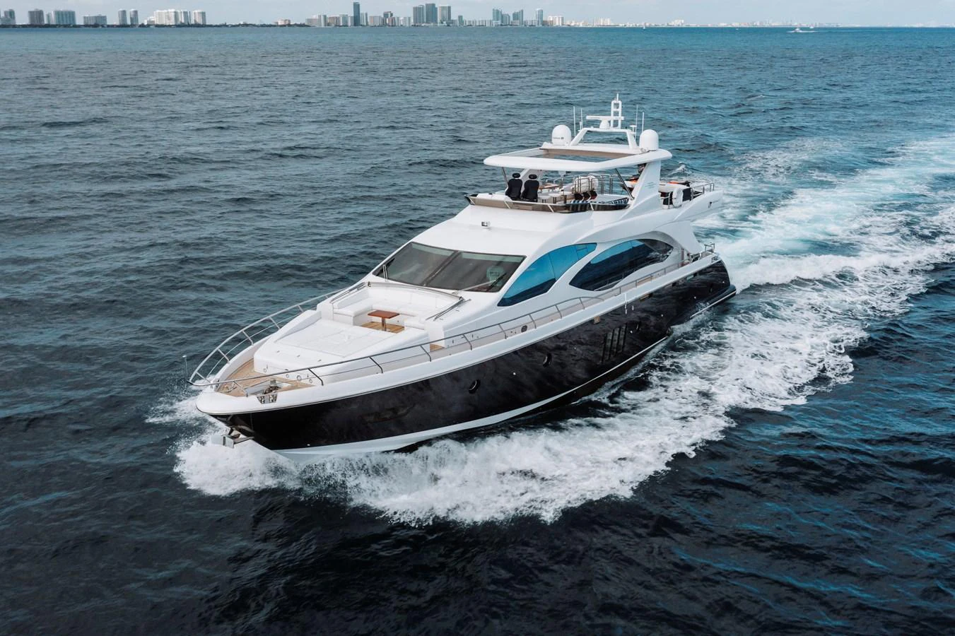 a white yacht on the water aboard RESET Yacht for Sale