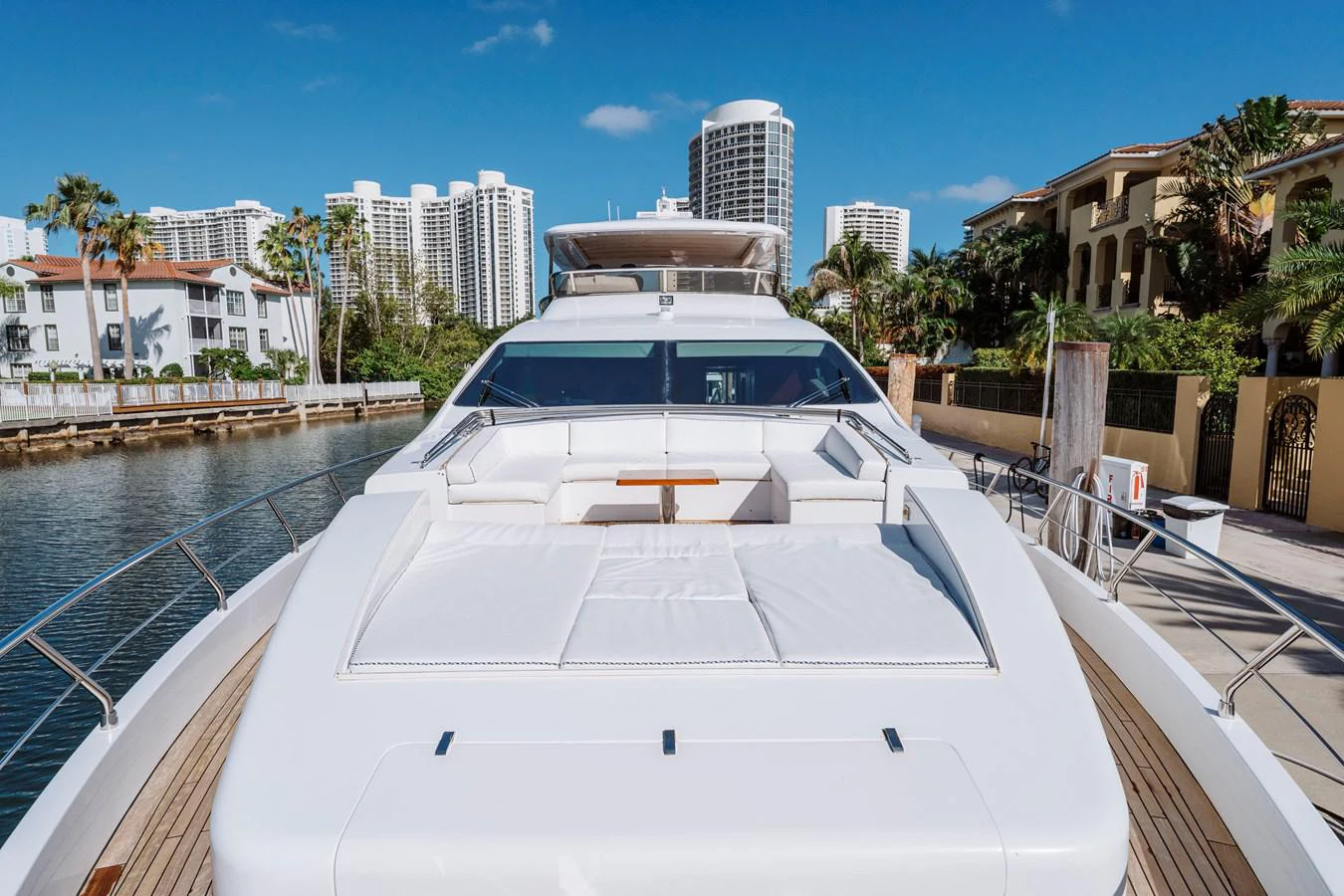 a large white boat in a body of water aboard RESET Yacht for Sale