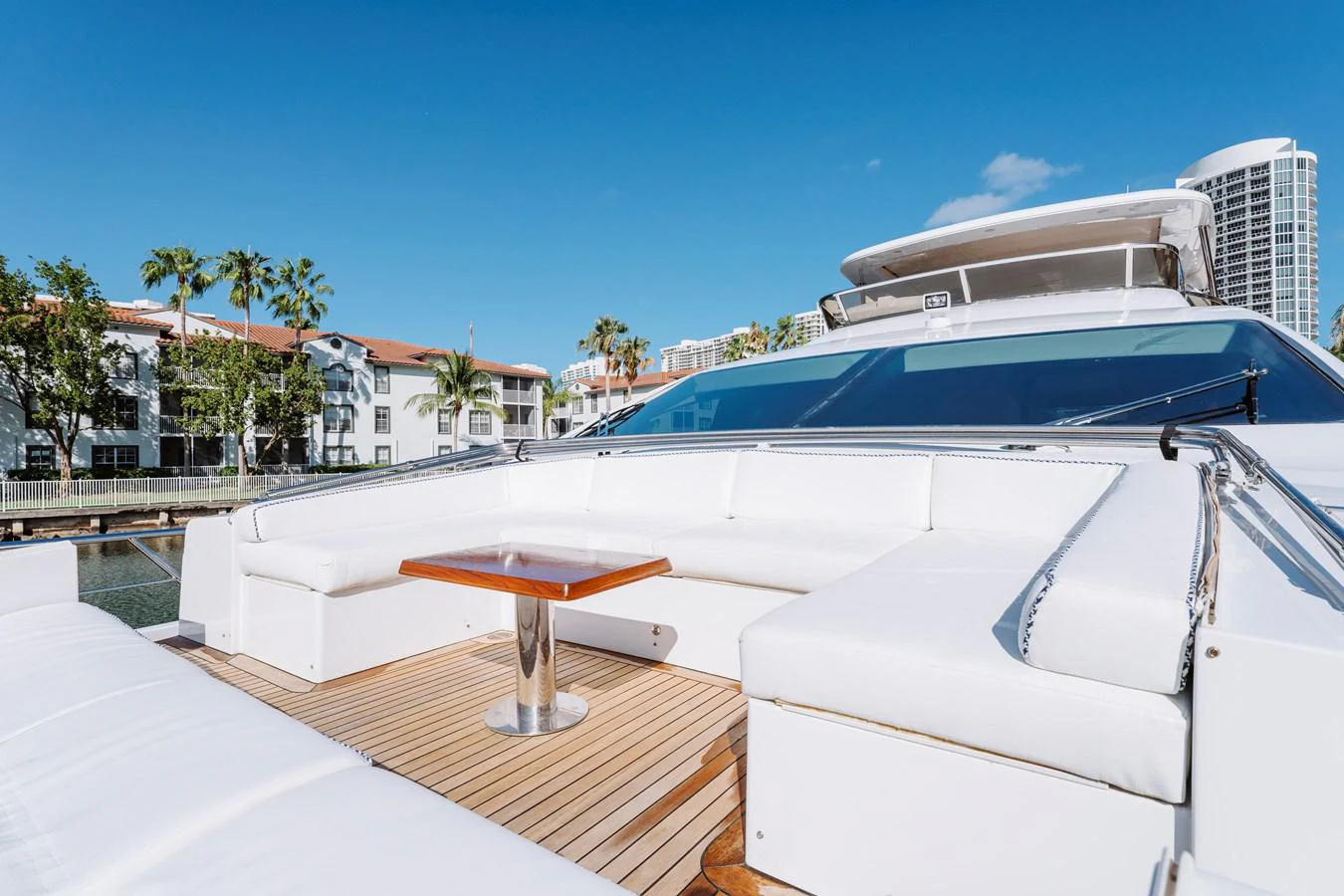 a white boat on a deck aboard RESET Yacht for Sale