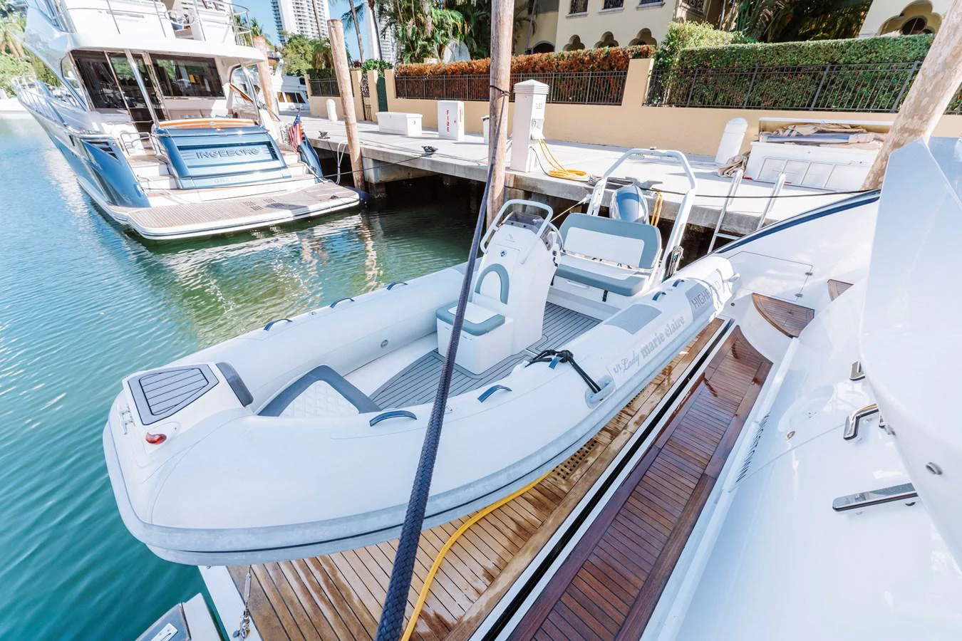 a boat parked in a harbor aboard RESET Yacht for Sale